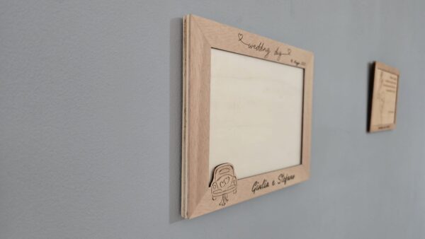 cornice legno matrimonio